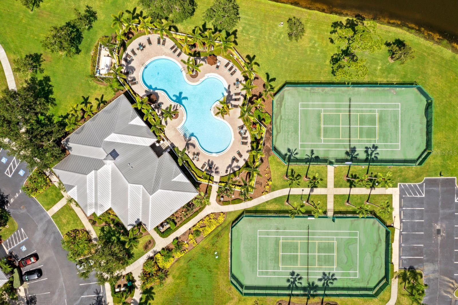 The pool and tennis courts are just behind the clubhouse.
