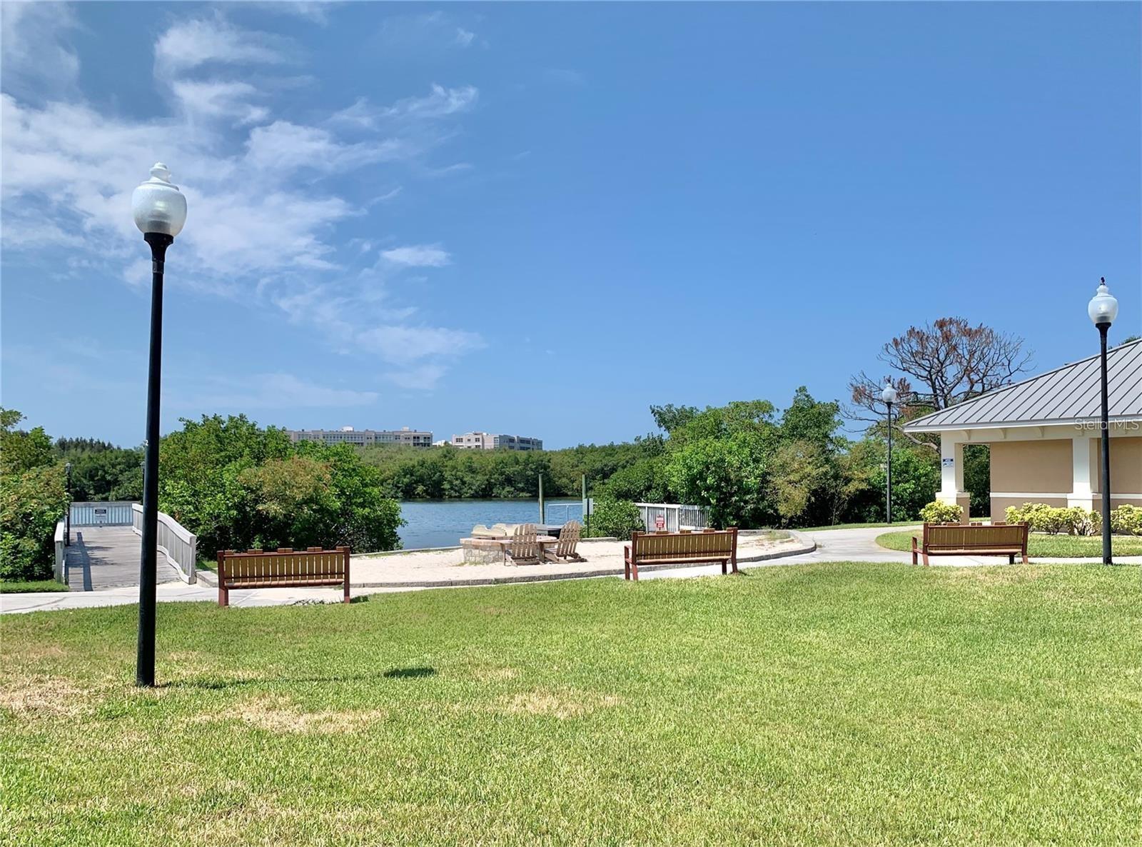 The beach area....boathouse storage to the right for your kayaks, canoes, paddleboards, etc.