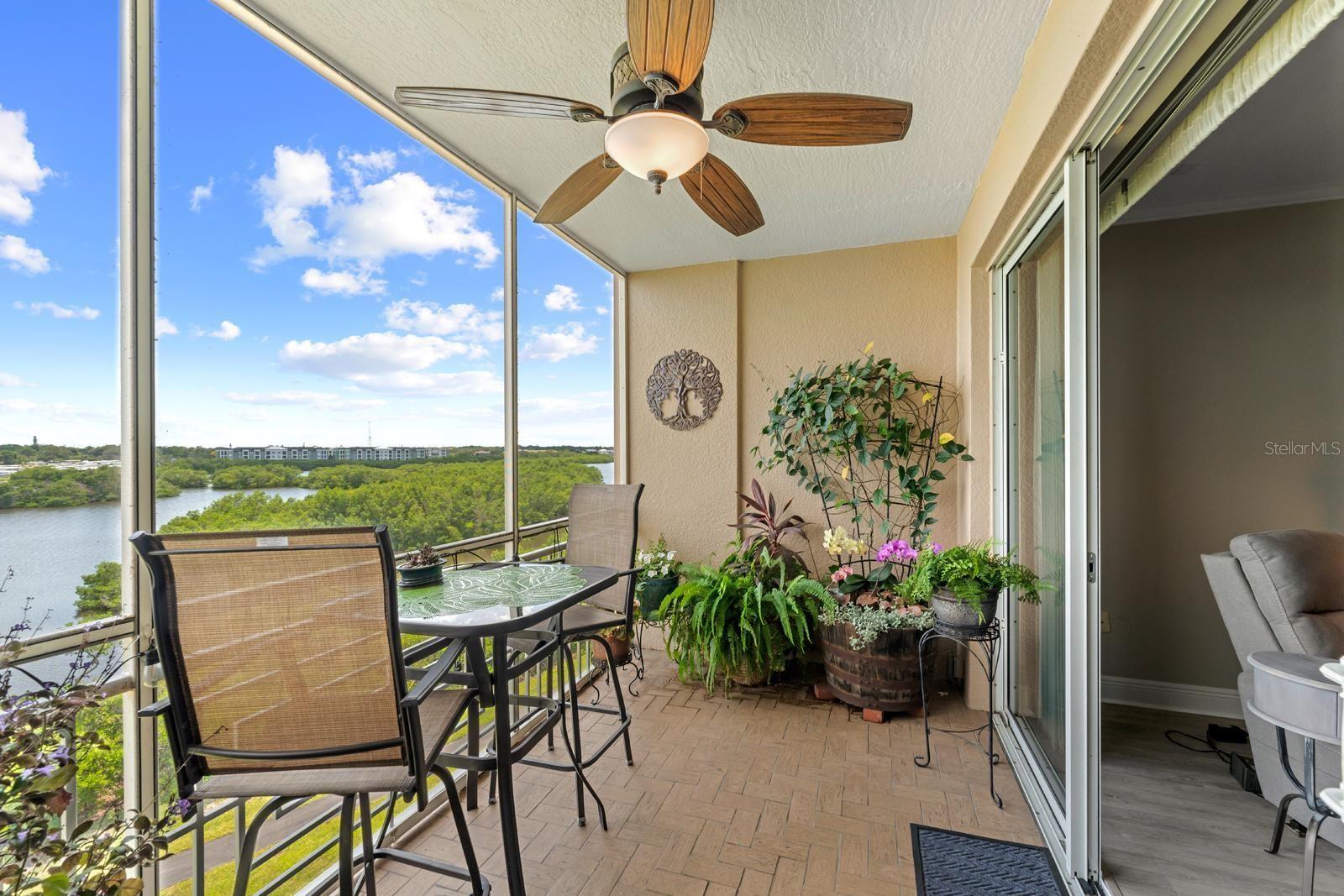Notice the pavers and the lighted ceiling fan updates.  The glass slider doors are the highest quality and storm-rated ES windows.