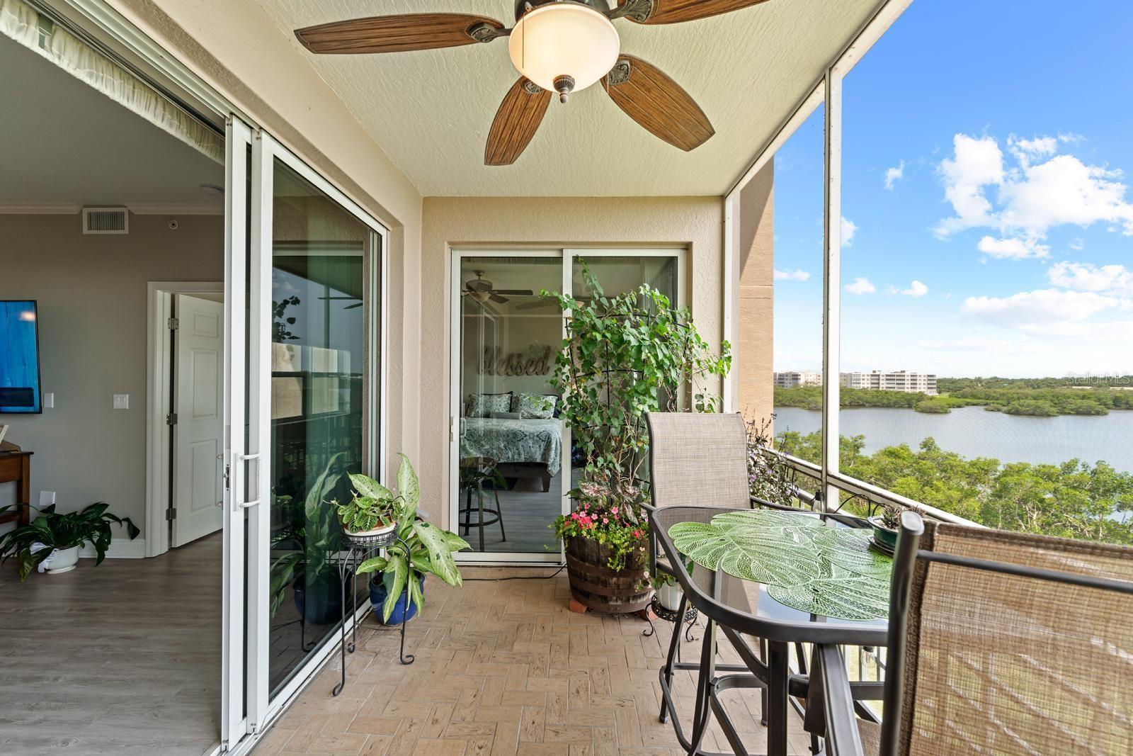 Notice the pavers and the lighted ceiling fan updates.  The glass slider doors are the highest quality and storm-rated ES windows