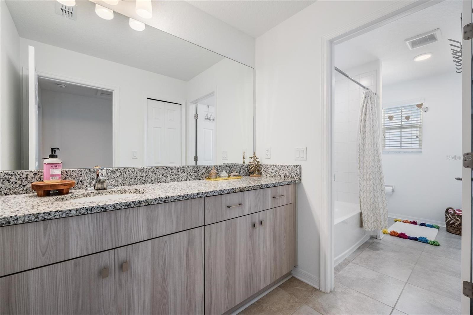 Dual sinks in secondary bathroom
