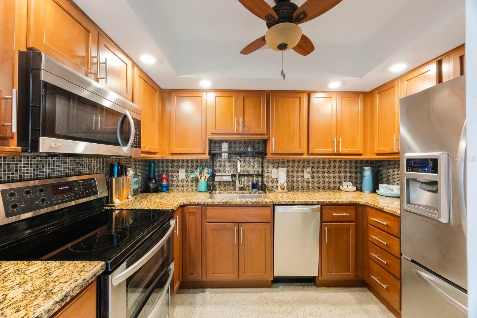 Kitchen with Granite Counters and Stainless Steel Appliances