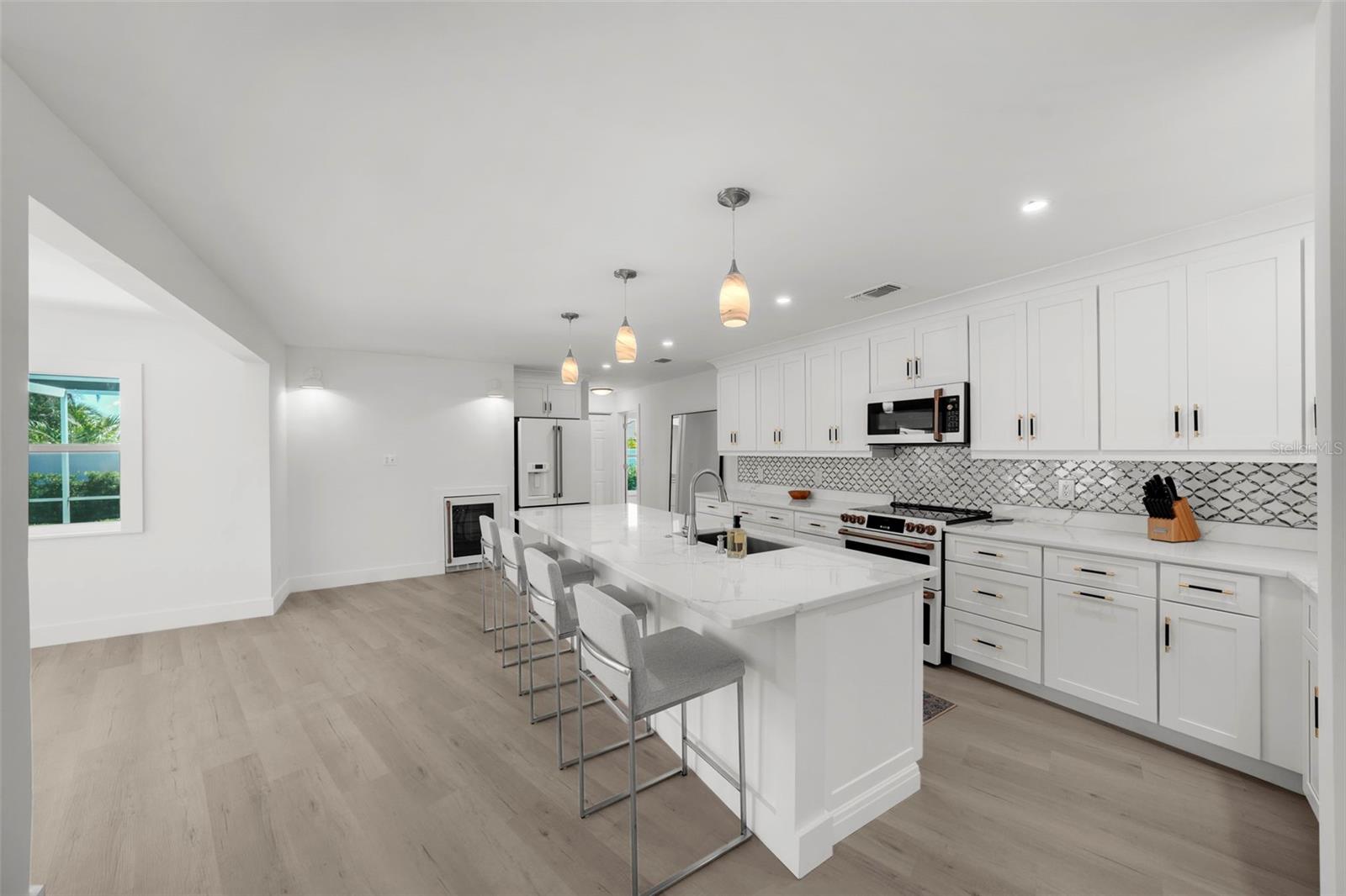 Bright, open kitchen with ample counter and cabinet space