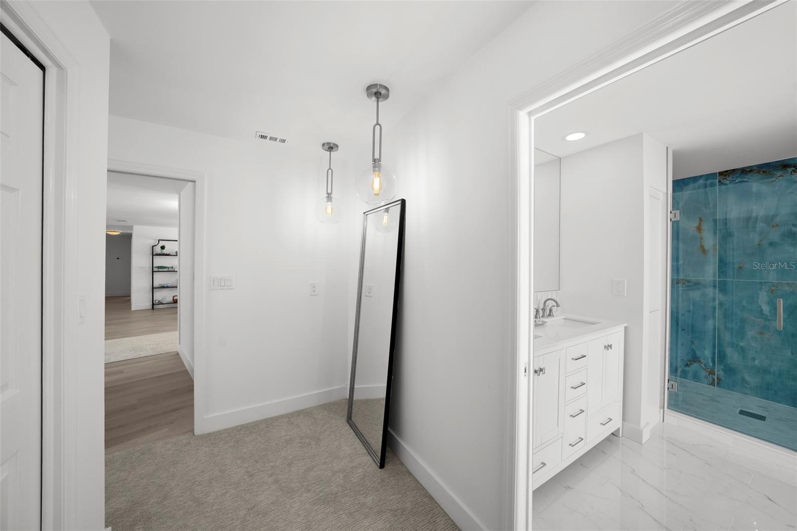 Separate nook for a vanity, full length mirror, another area to personalize!