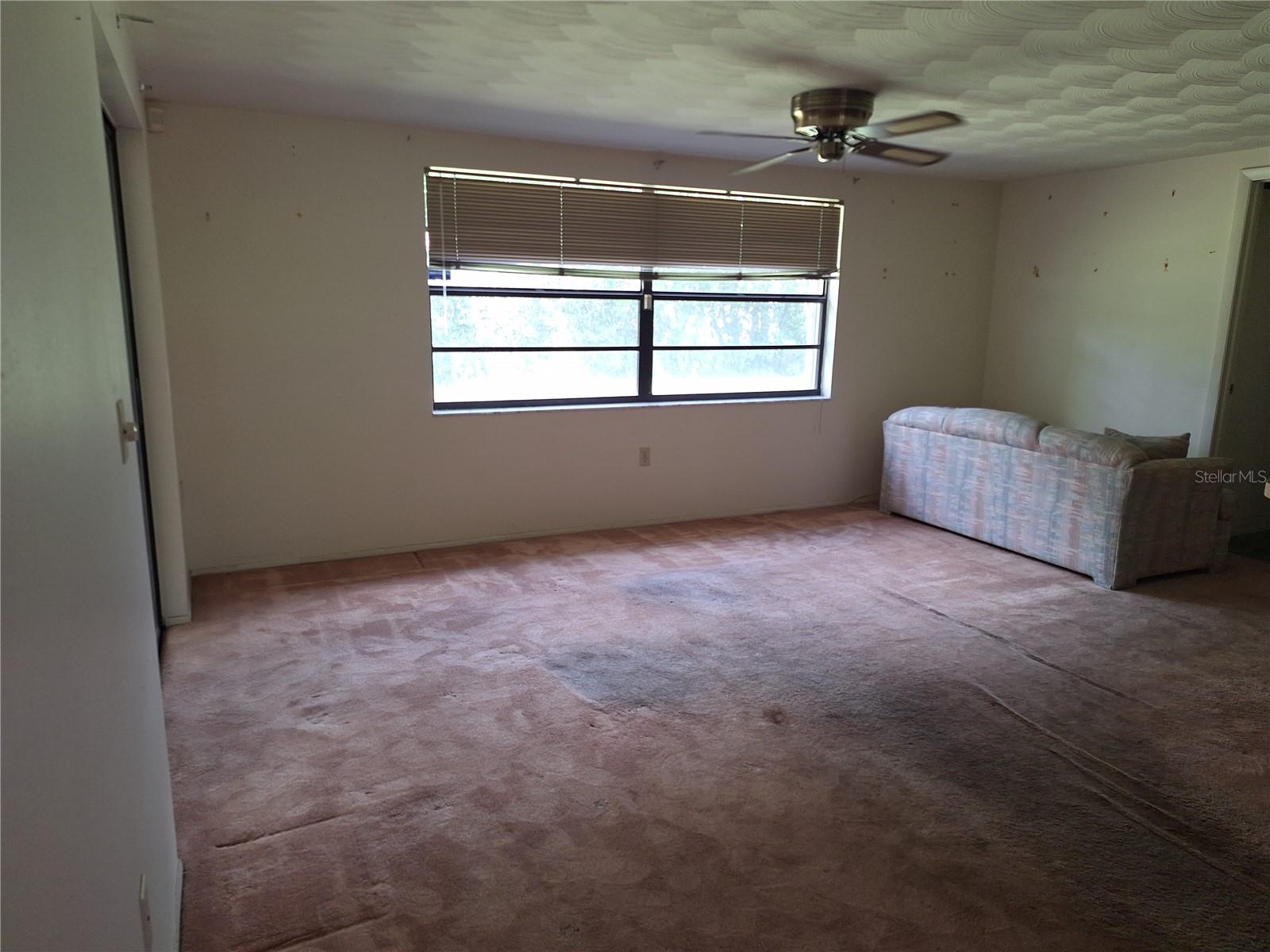 All it needs is Flooring! Huge Family Room
