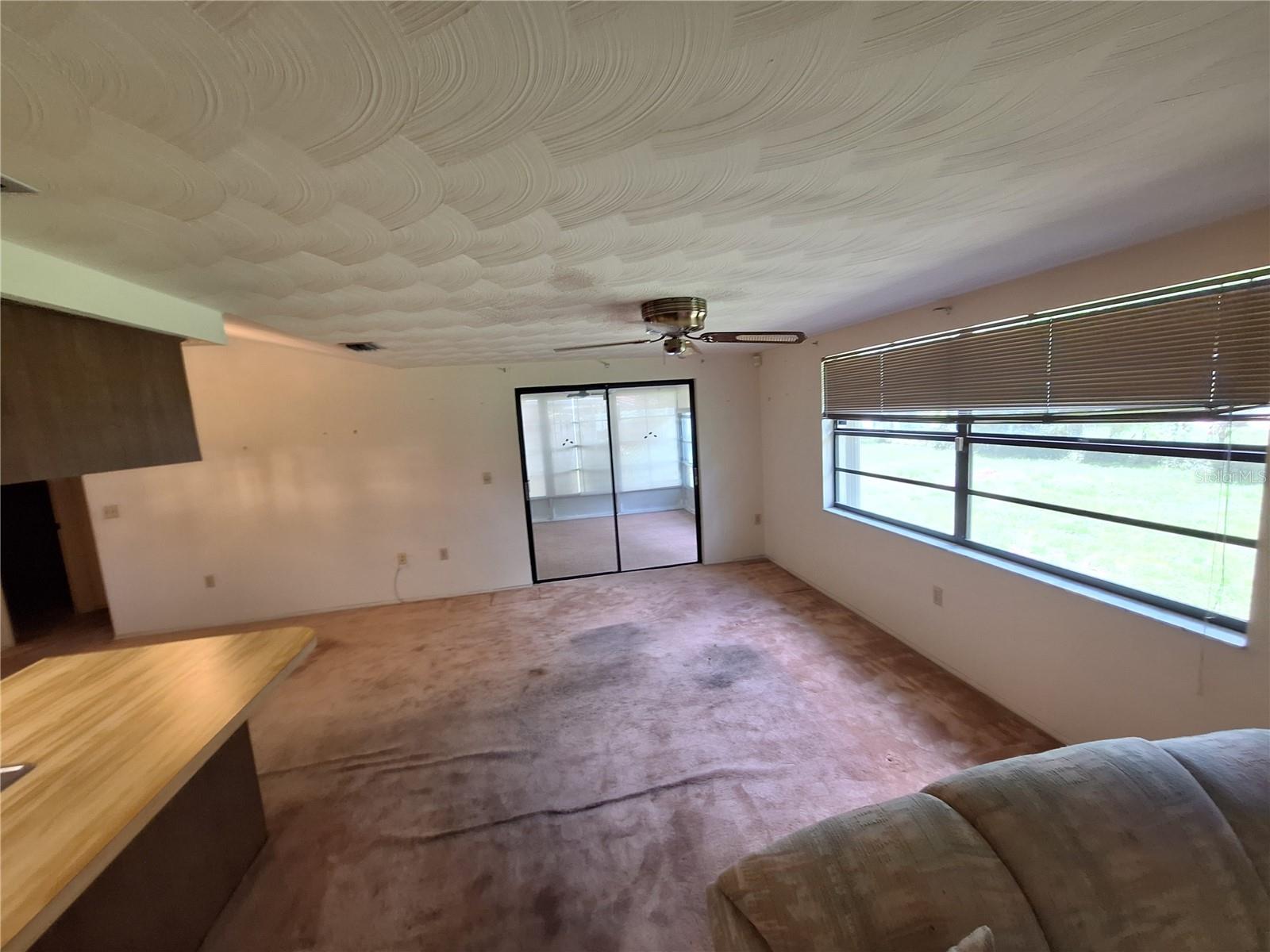Sliders Lead out to the Vinyl Enclosed Lanai
