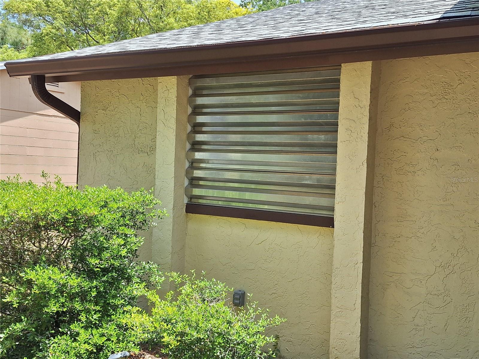 Metal Hurricane Shutters for each Window