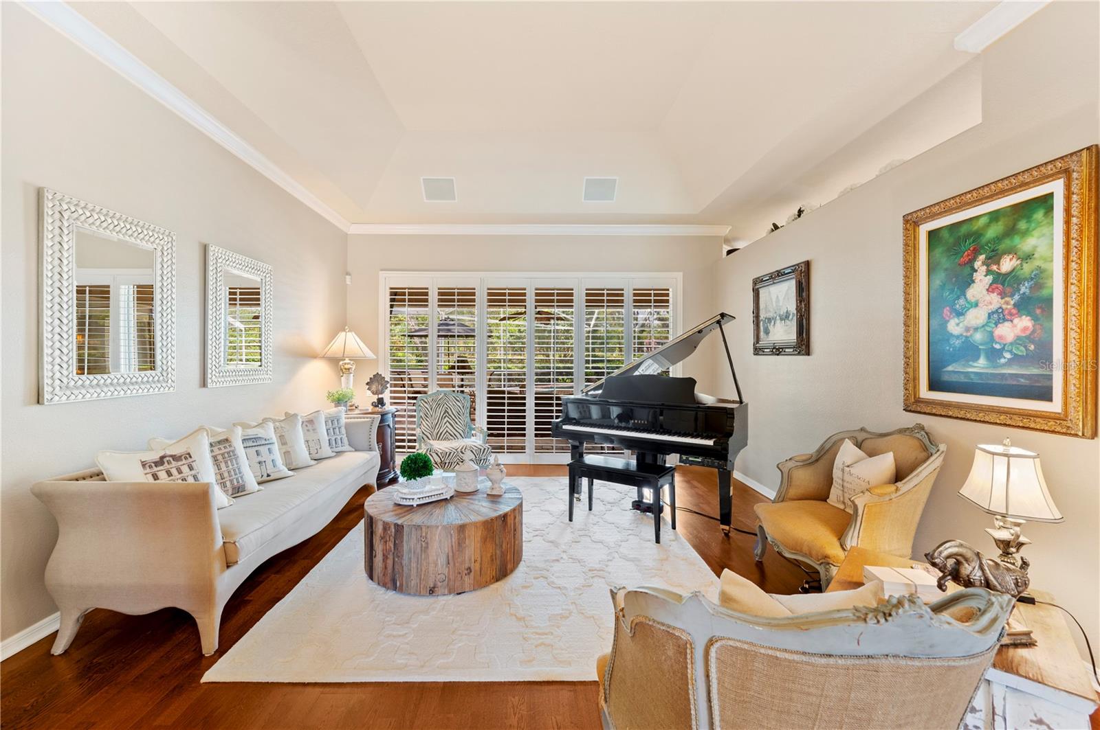 Sitting Room opens to the lavish outdoors