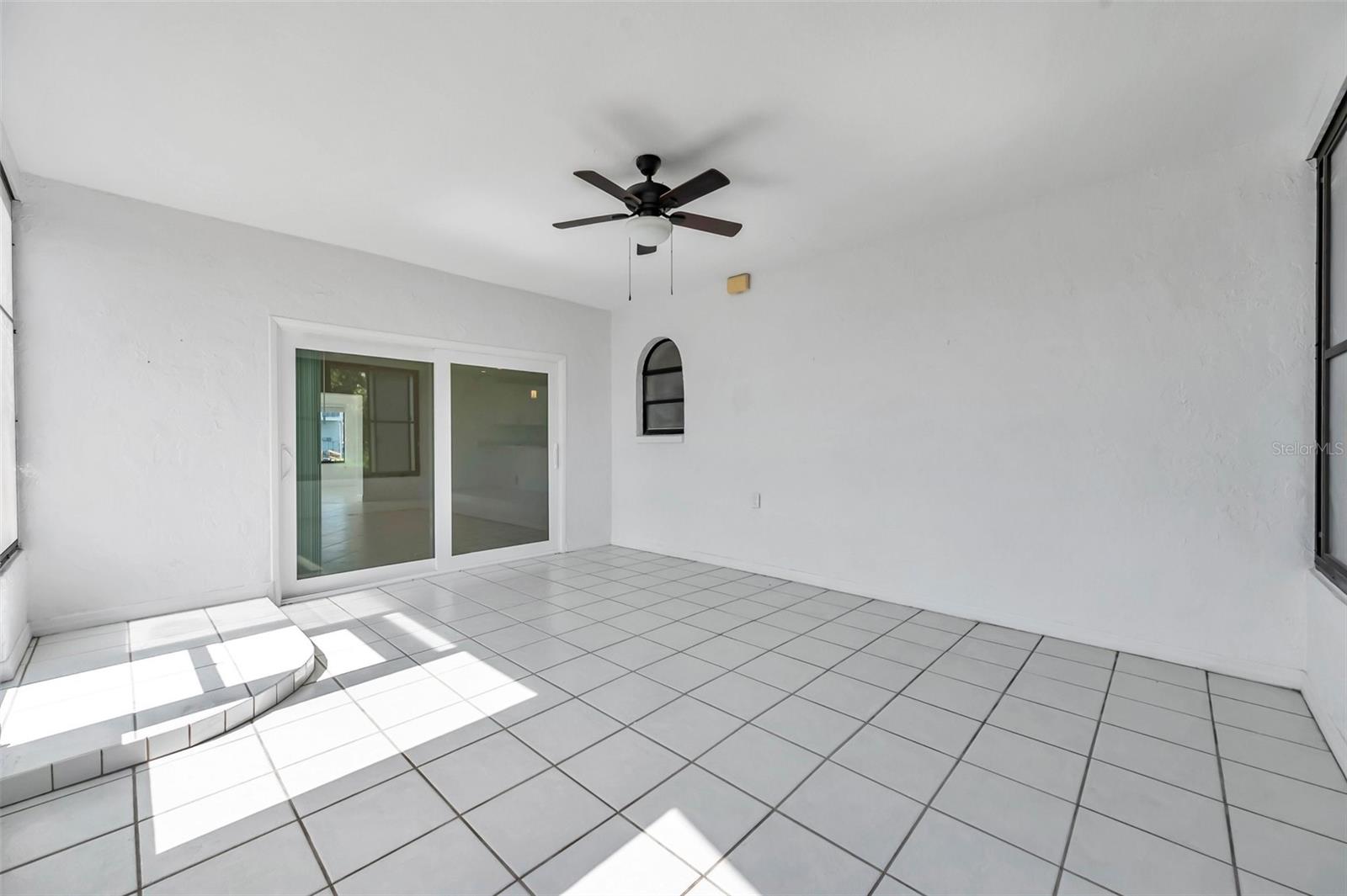 Screened porch with New Impact Resistant Sliding door