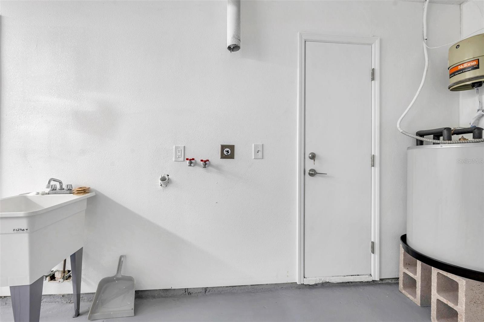 laundry sink and washer and dryer hookup