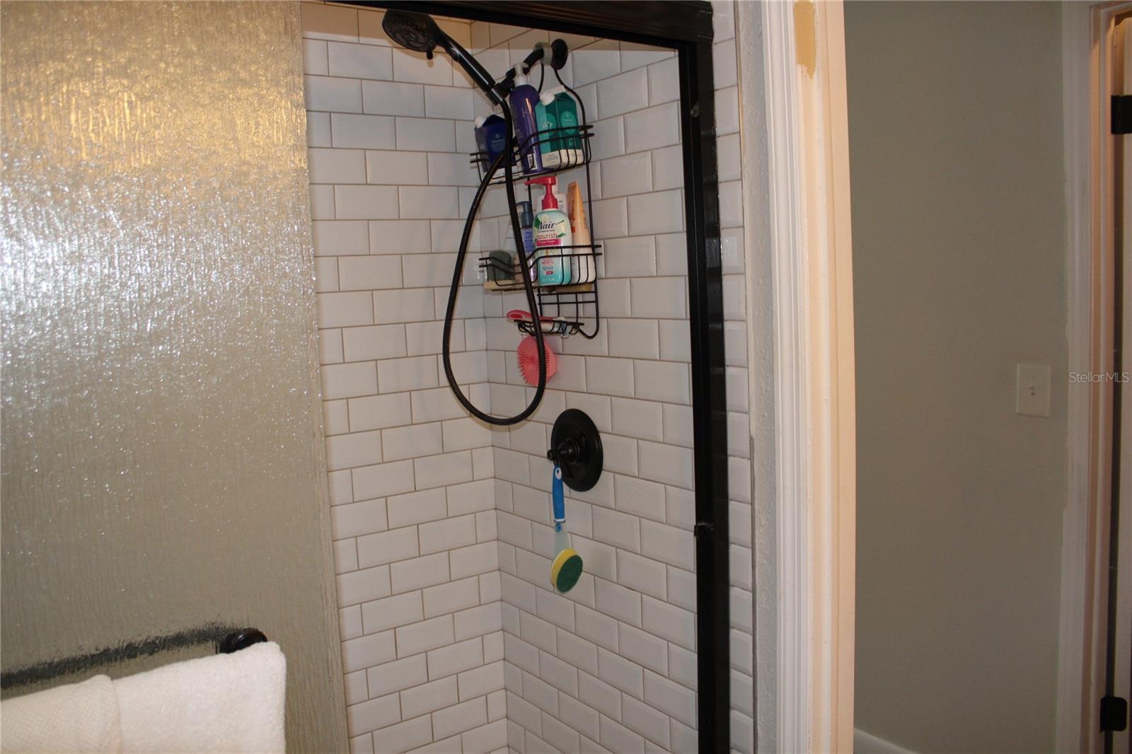 Primary bath has walk-in shower.