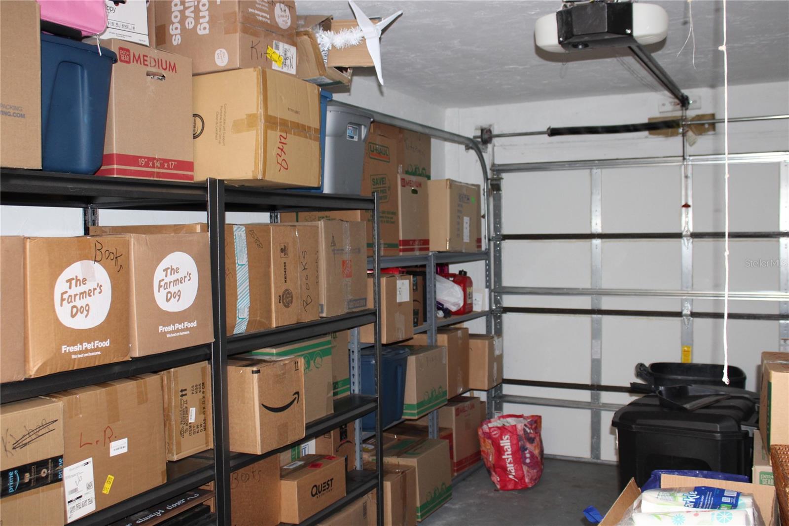 Garage has newer door and opener