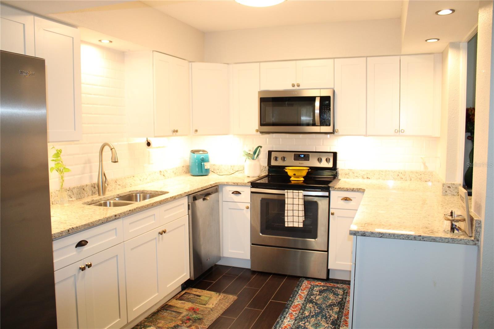Plenty of cabinets and counter space.
