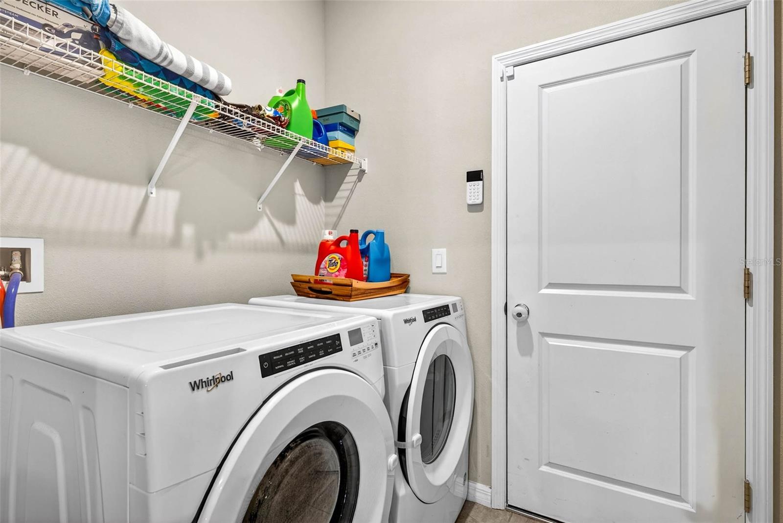 Laundry room leads to the garage.