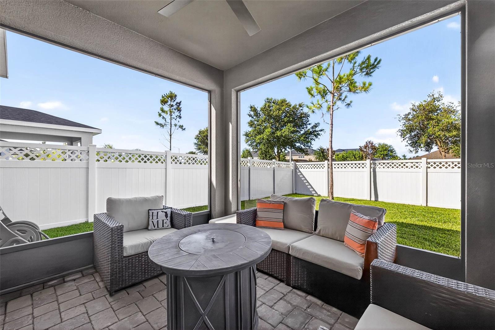 Screened lanai and fenced in private back yard.