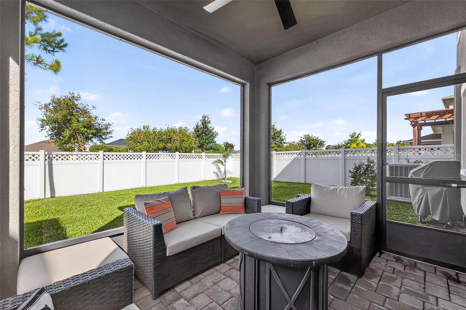 Screened in lanai with large backyard fully fenced in.