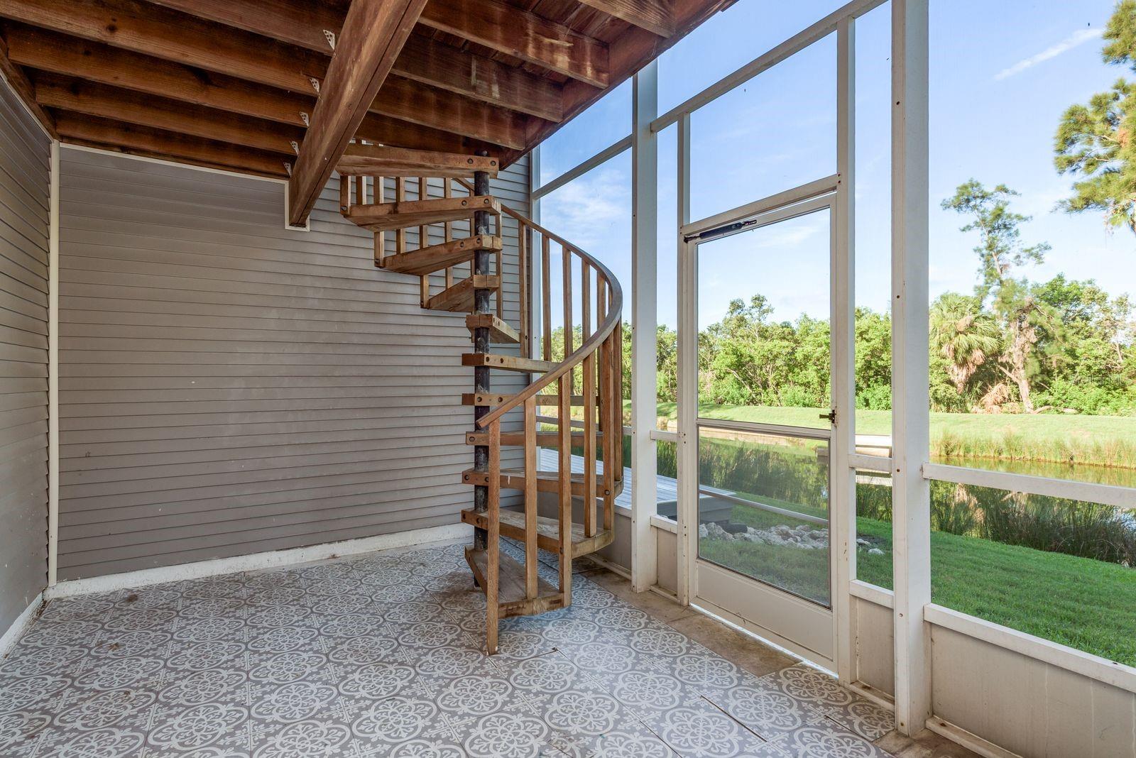 Walk out porch stairs to upstairs deck