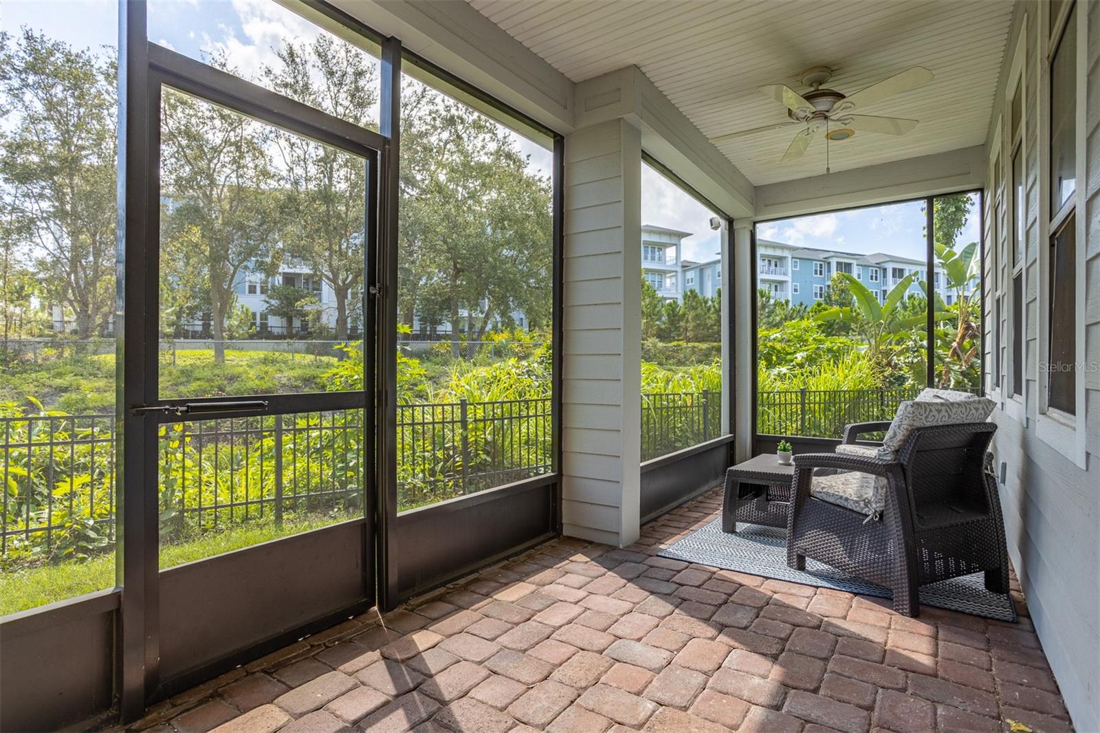 Enjoy bikers on the Pinellas trail from the privacy of your fully screened in patio