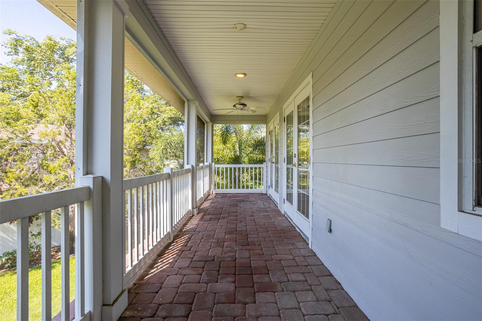 Fully screened in balcony off  bonus room overlooking luscious  back yard