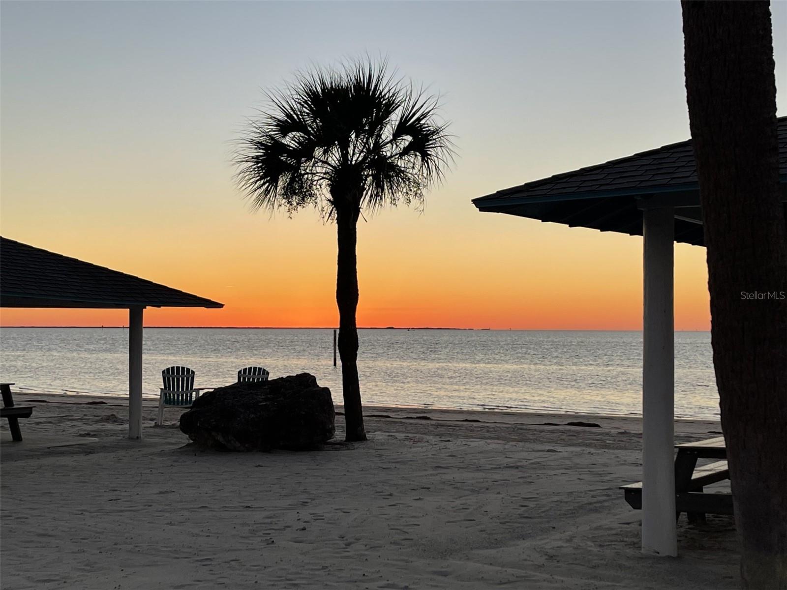 Private beach includes cabanas, parking, grills and restrooms