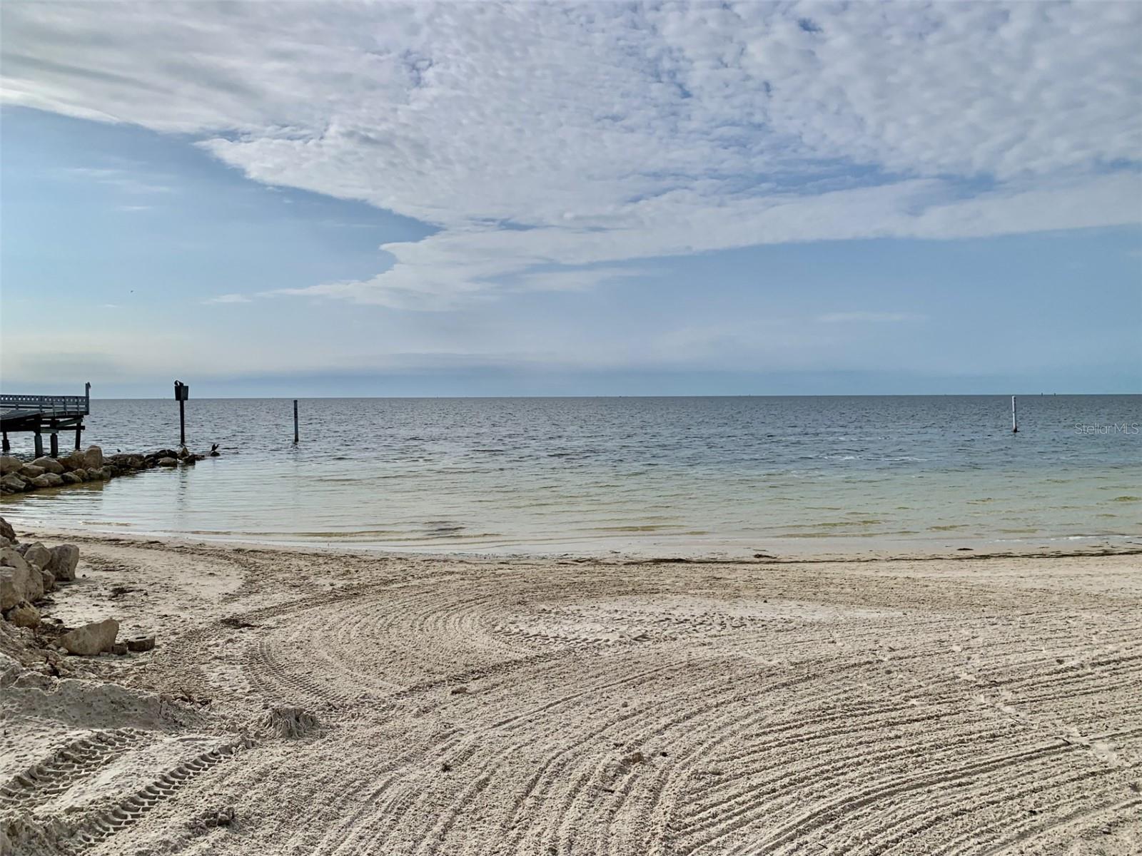 Private beach includes cabanas, parking, grills and restrooms