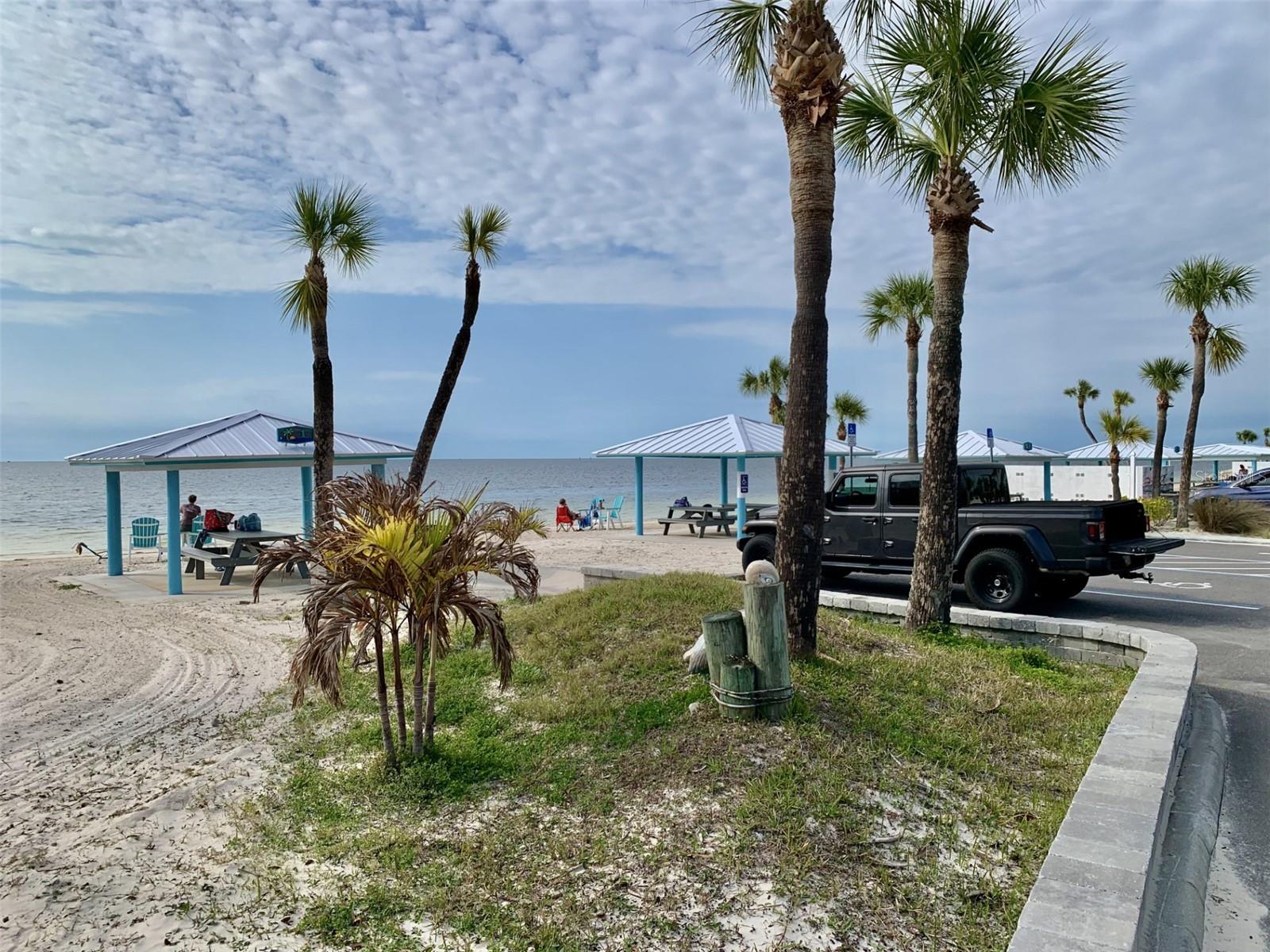 Private beach includes cabanas, parking, grills and restrooms