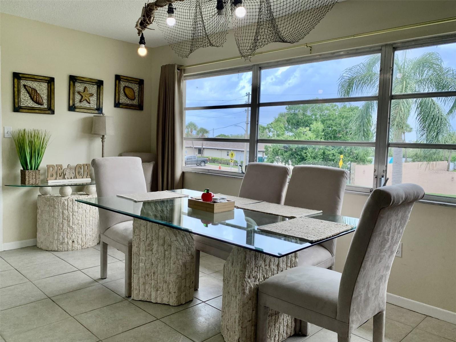 Florida room is large and bright. Some use the space as a 2nd bedroom. Current owner used as a large family dining room.