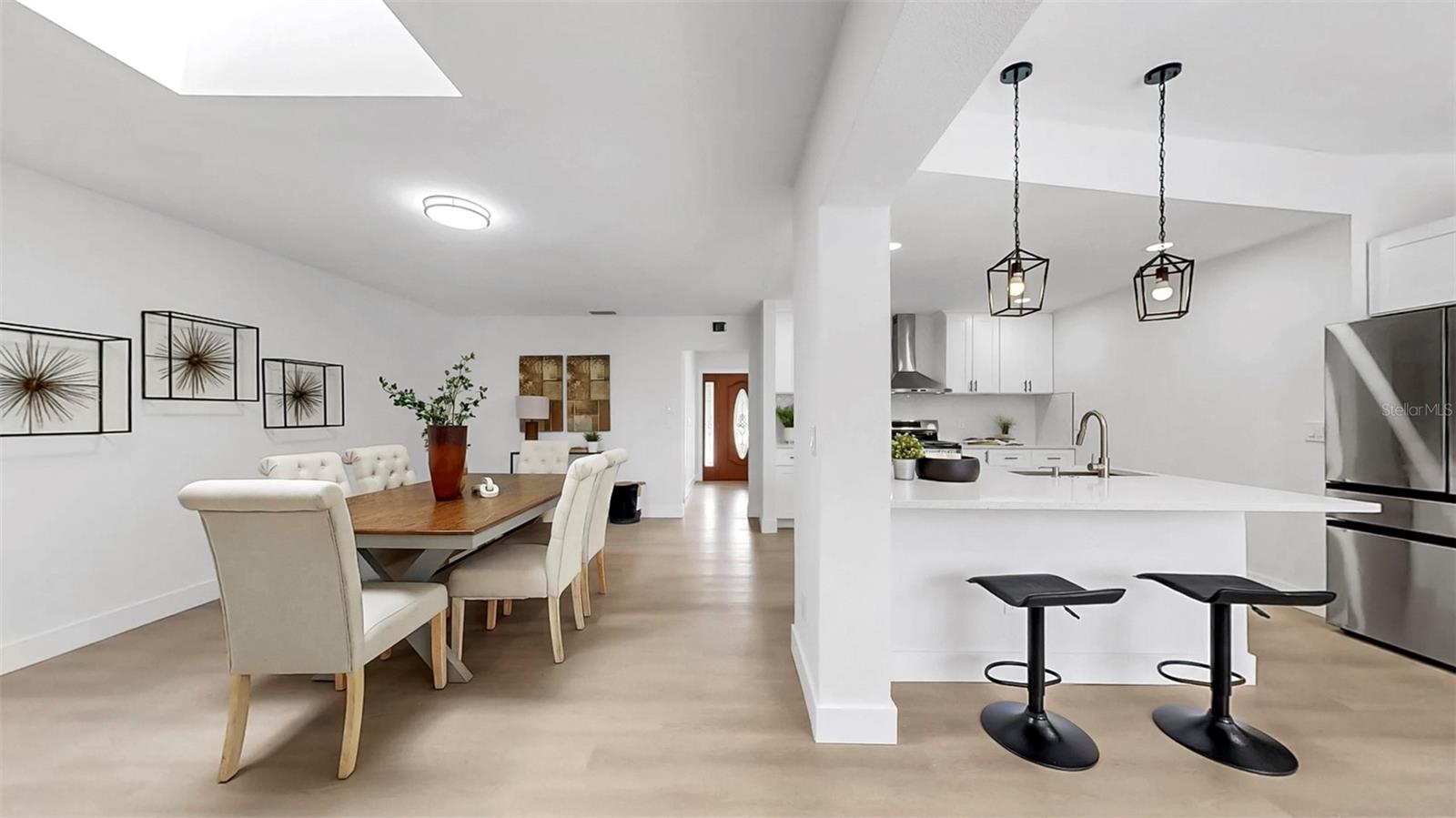 Dining room leads to kitchen