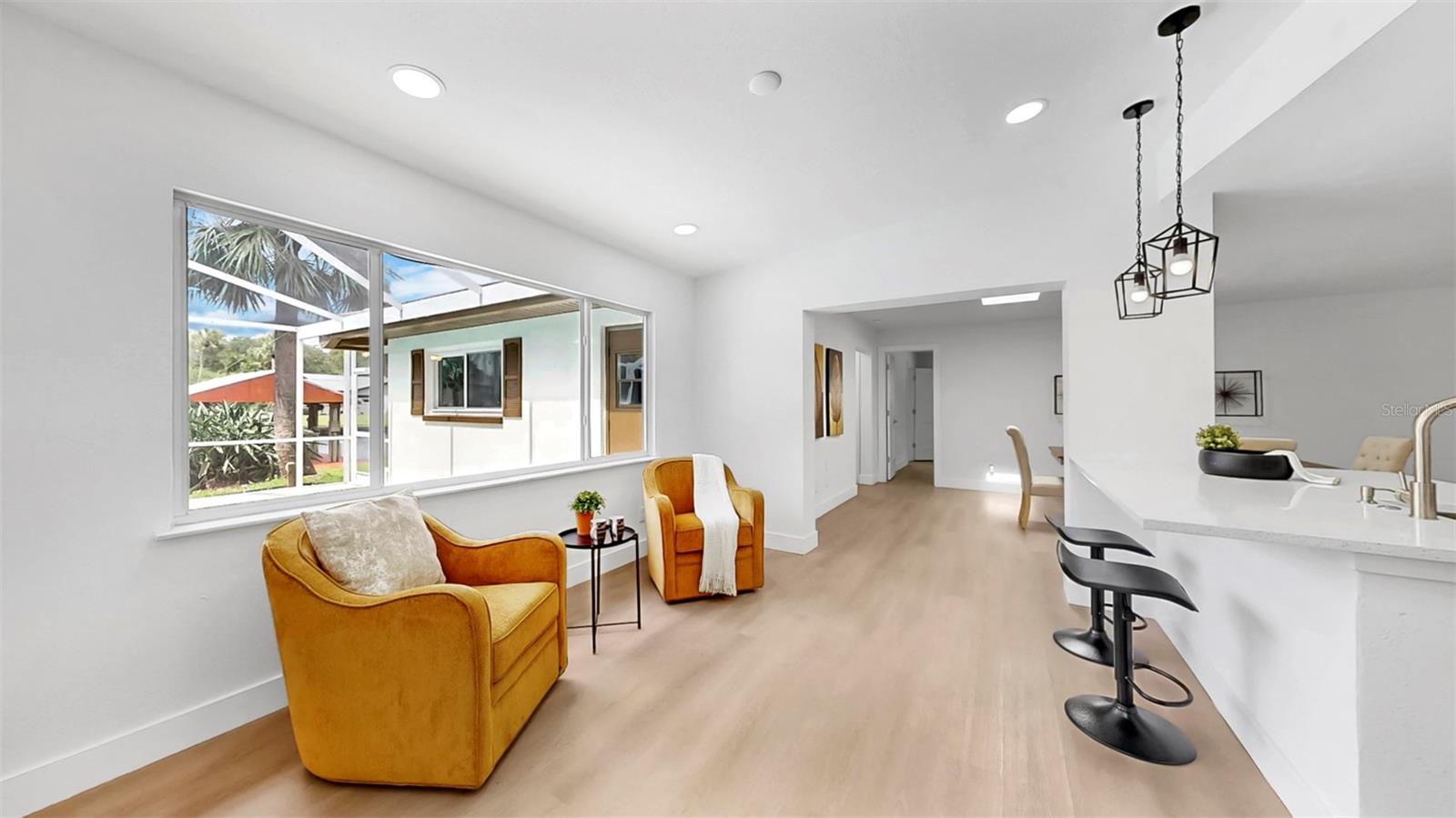 Bonus/ flex space overlooking the pool and waterfront.