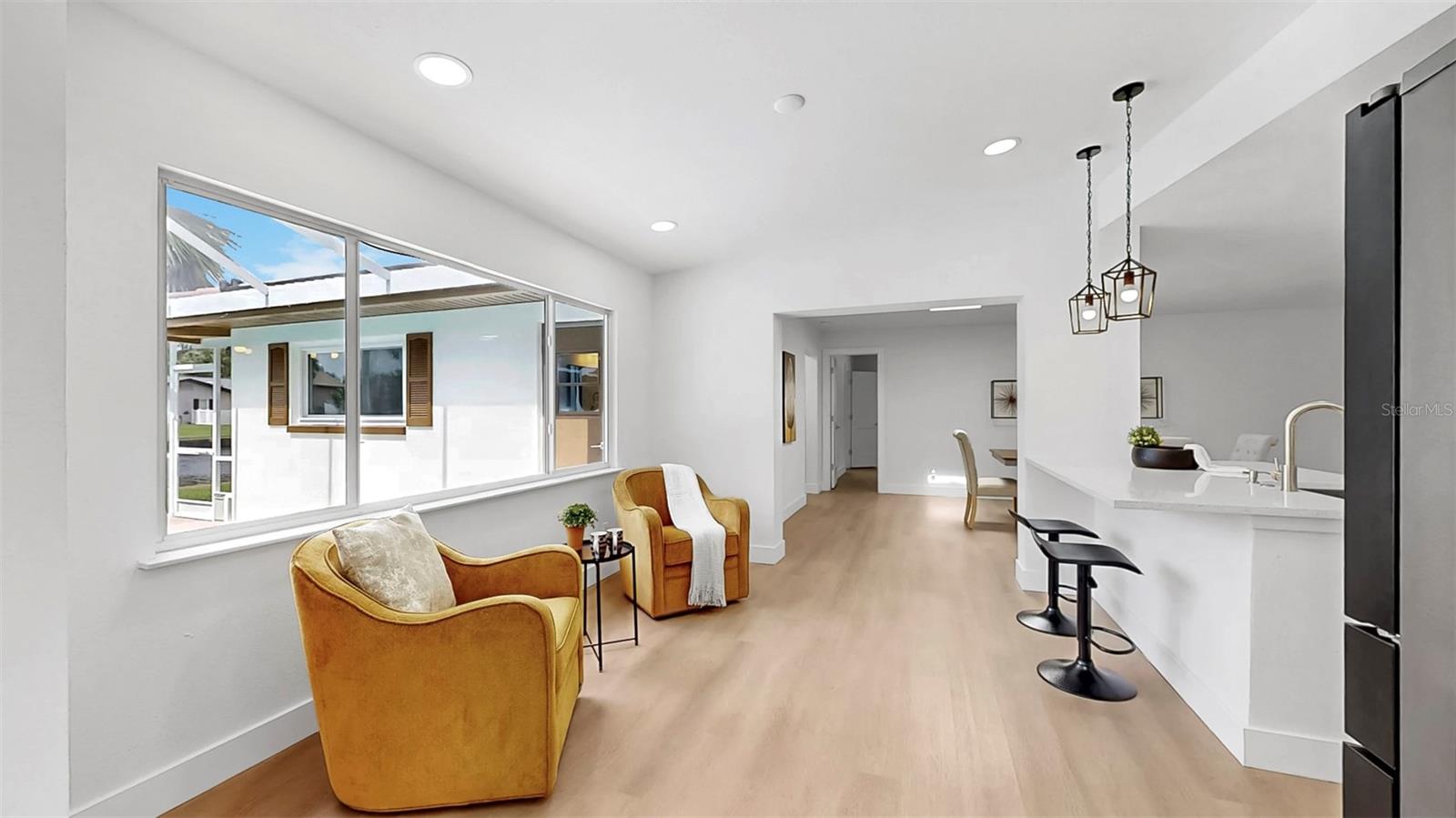 Bonus/ flex space overlooking the pool and waterfront.