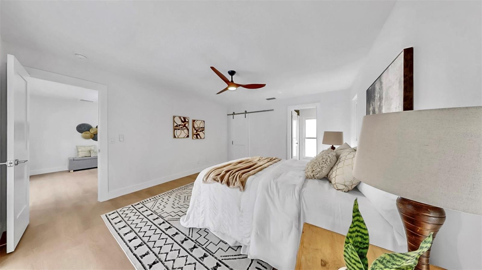 Spacious primary suite with walk-in closet and full bathroom.