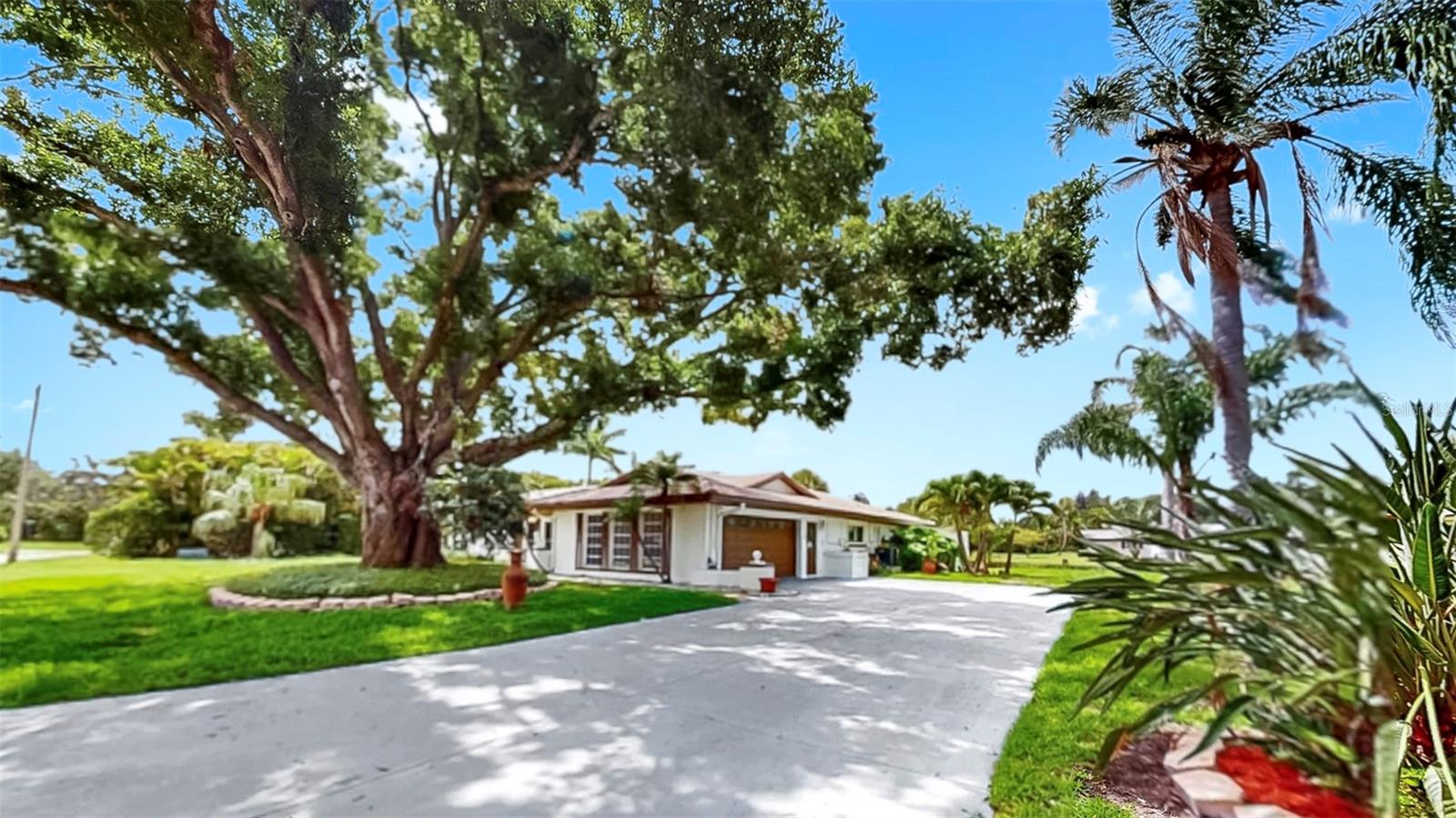 Extra large and long driveway leads to oversized 2-car garage