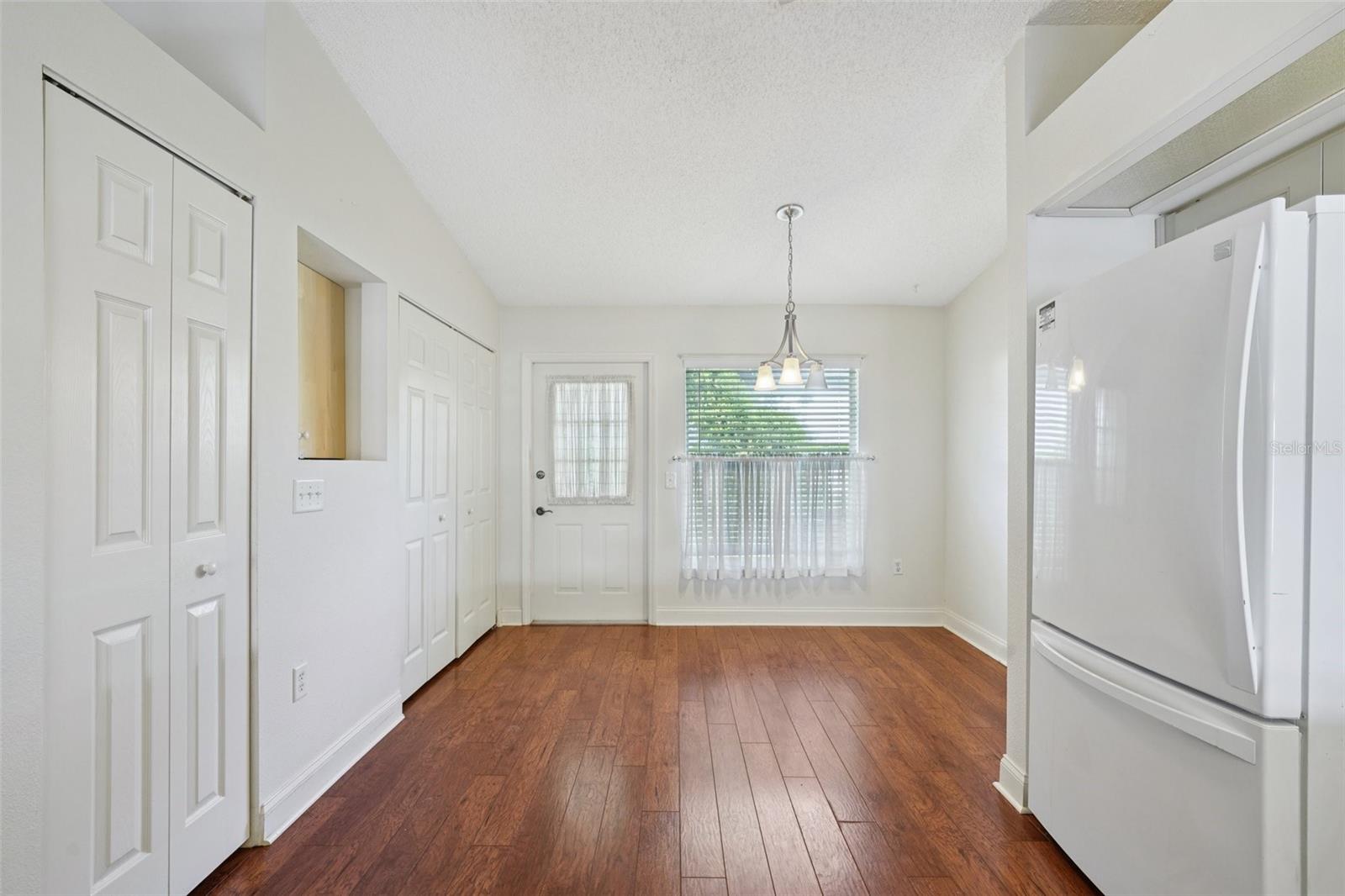 Dinette Space in Kitchen - Back door leads outside to Exterior Storage