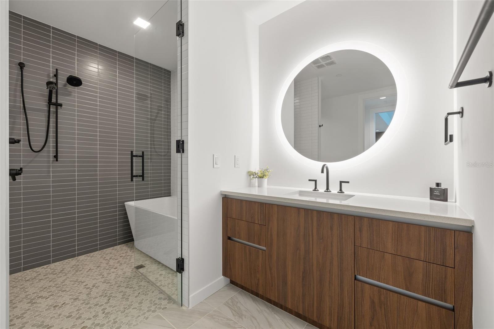 Master bathroom with walk-in and curb-less shower with soaking tub!