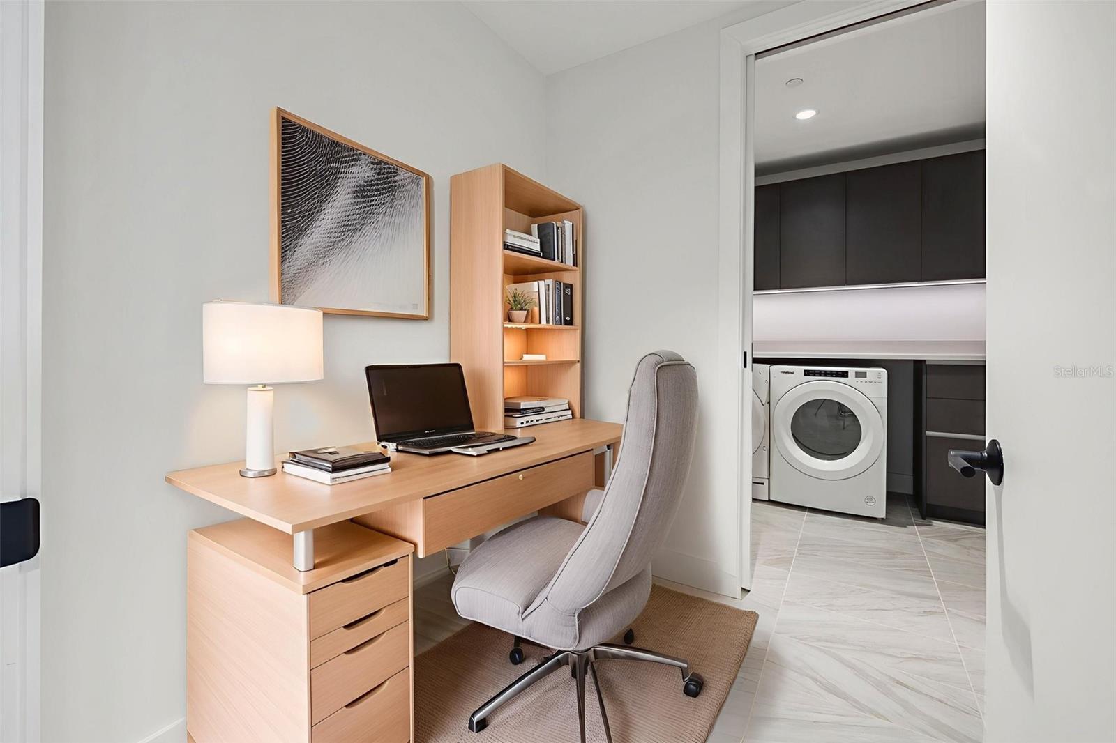 There is room across the den to add an in-home office