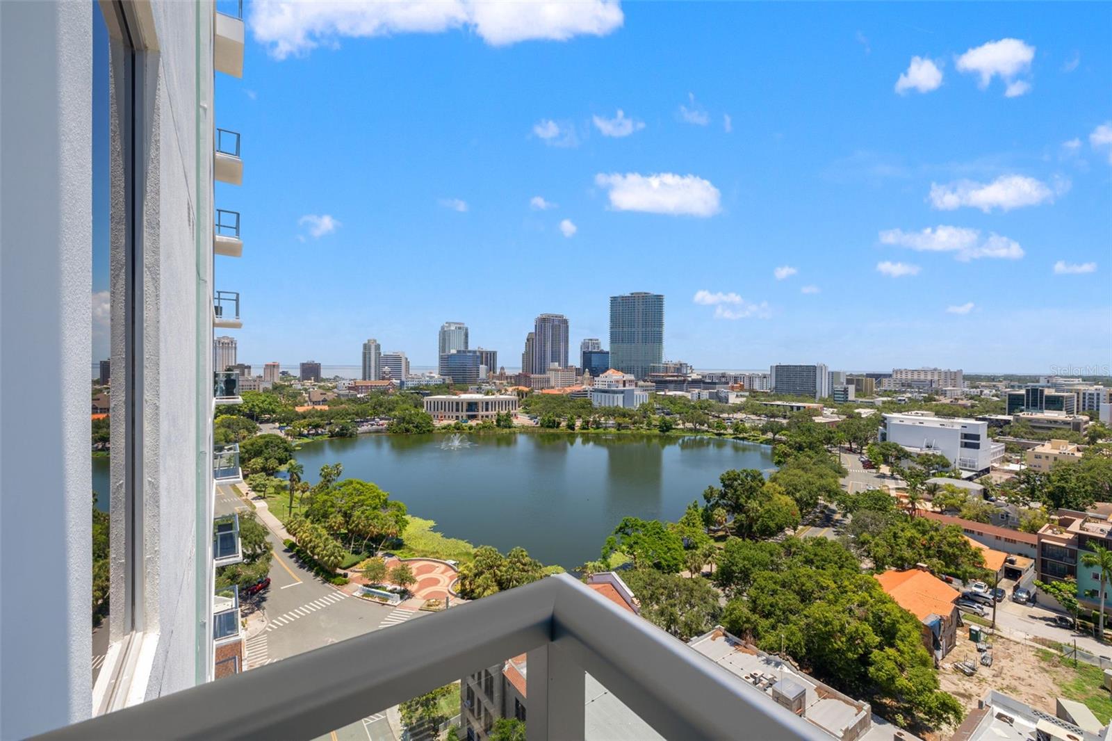 Private balcony overlooking Mirror Lake, Dowtown St. Pete skyline and Tampa Bay. Sunrise and Sunset from this residence!