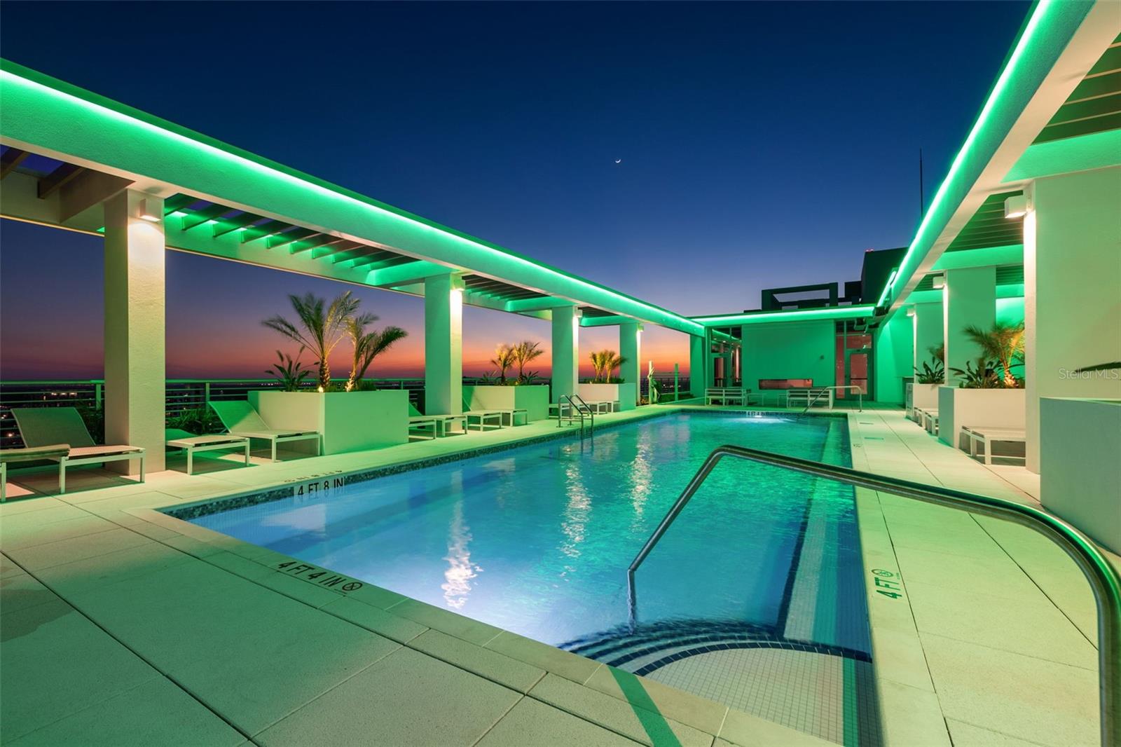 Night time rooftop pool views