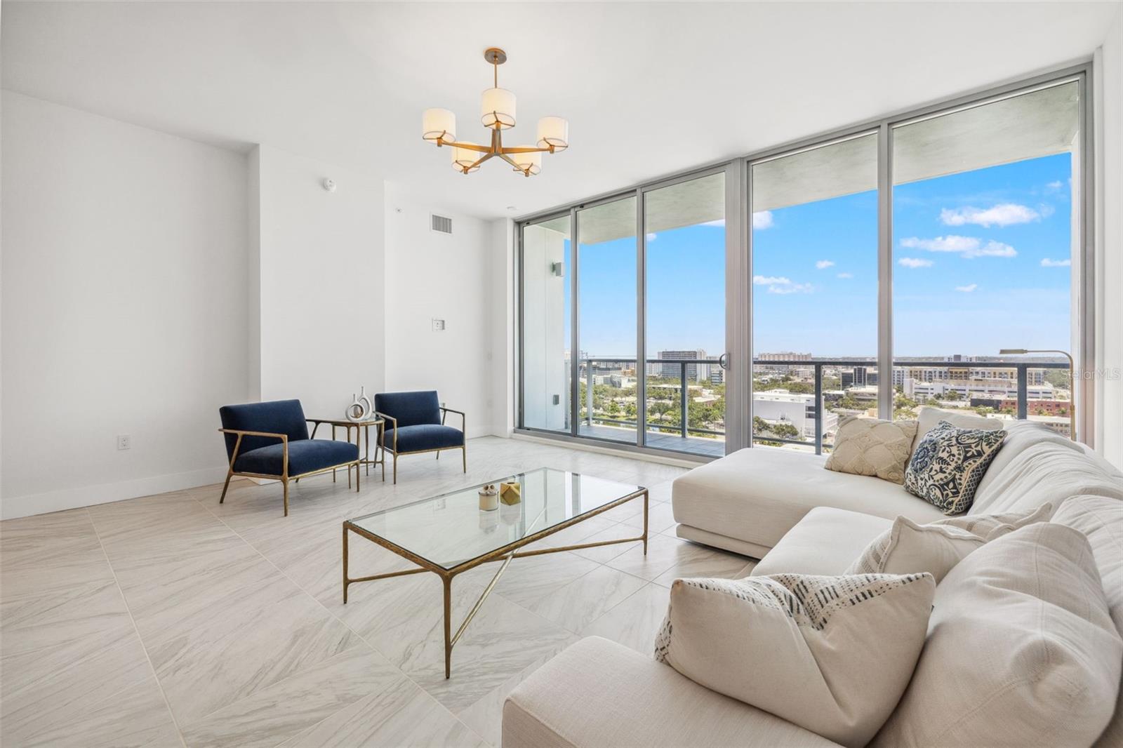 Floor to ceiling windows and sliders allowing tons of natural light!
