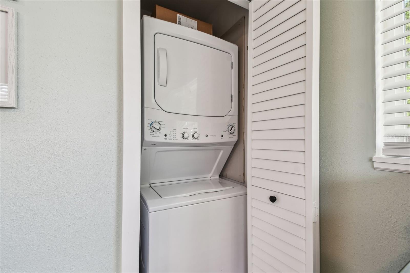 Laundry Closet in Primary Bedroom
