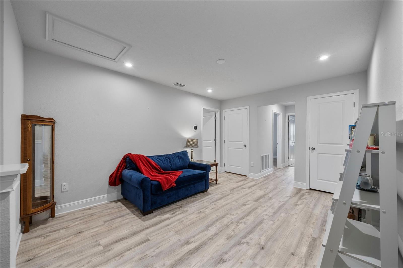 second floor loft with updated vinyl flooring
