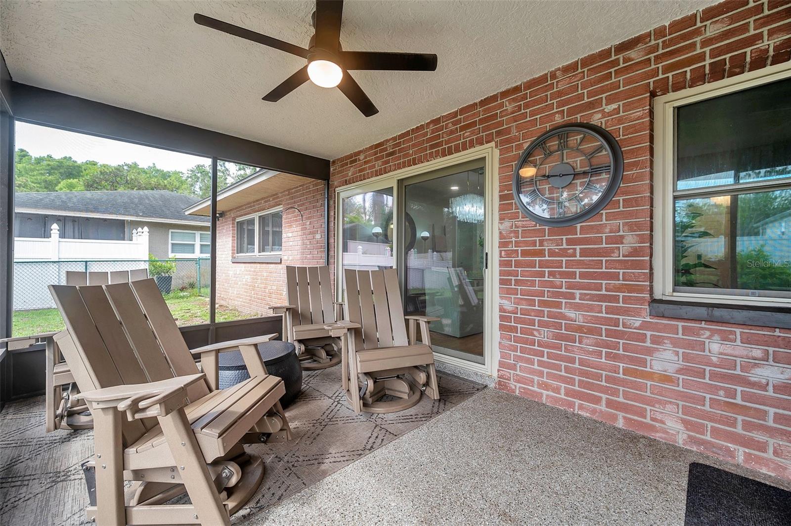 screened back porch with sliders to Dining and Family room