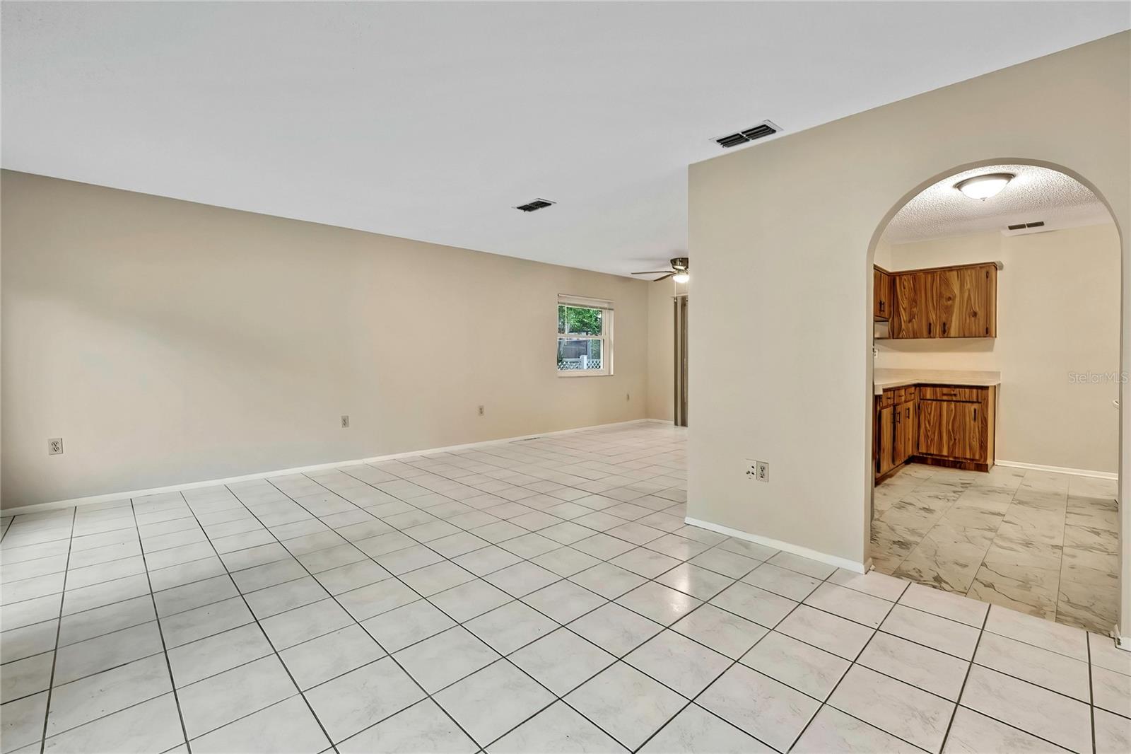 Living room with view of dining area and kitchen