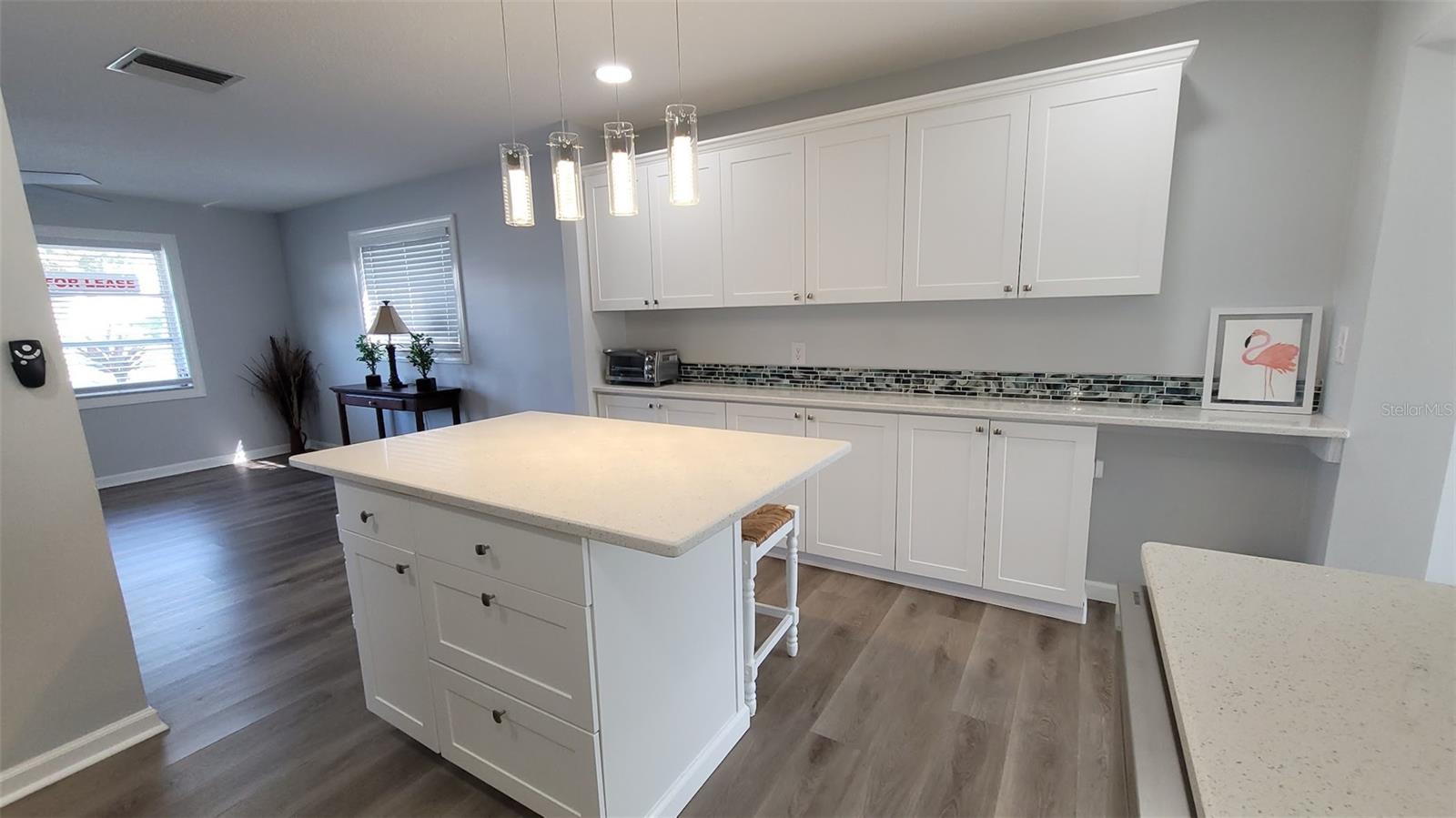 The additional wall of cabinets are ideal for storage that is always needed.