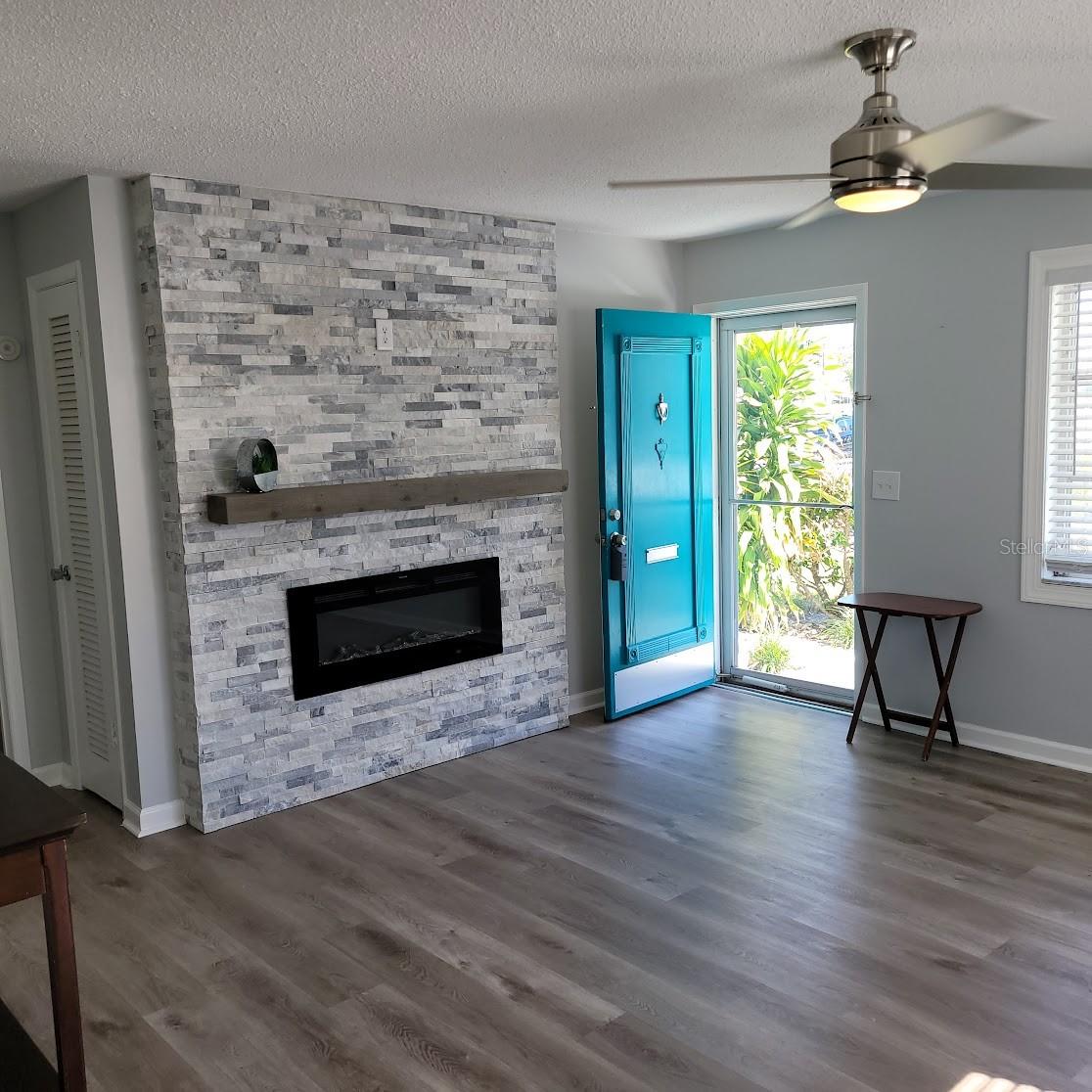 The fireplace wall is a great feature of this living room.