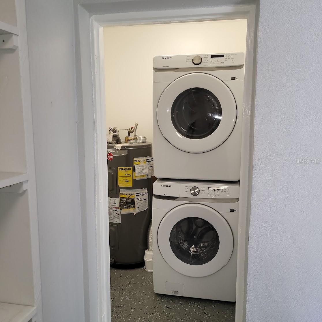 Across from the Storage area is the Utility Room which house the washer, dryer and water heater.