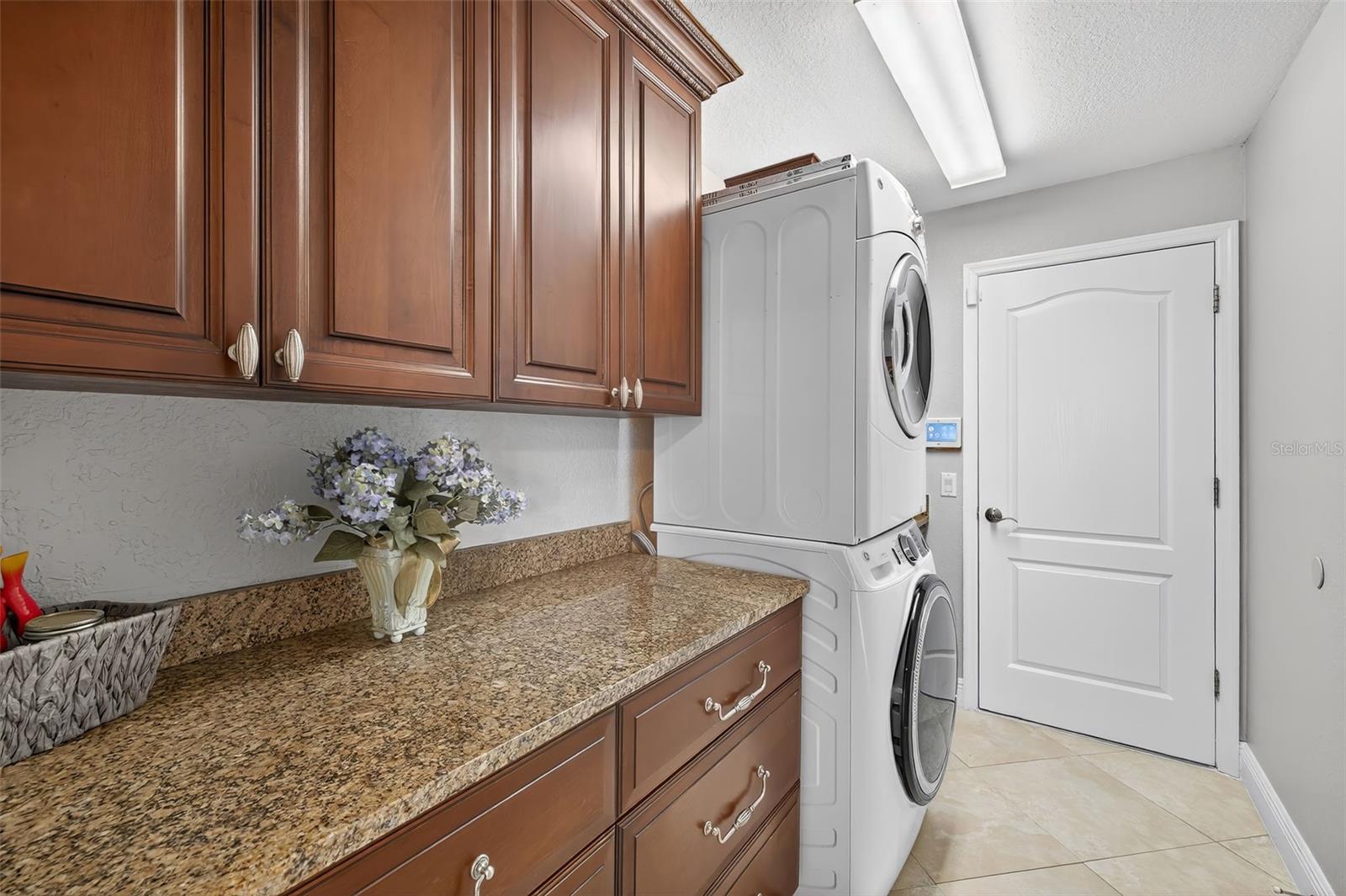 :aundry Room.  Sink on other side of Washer & Dryer