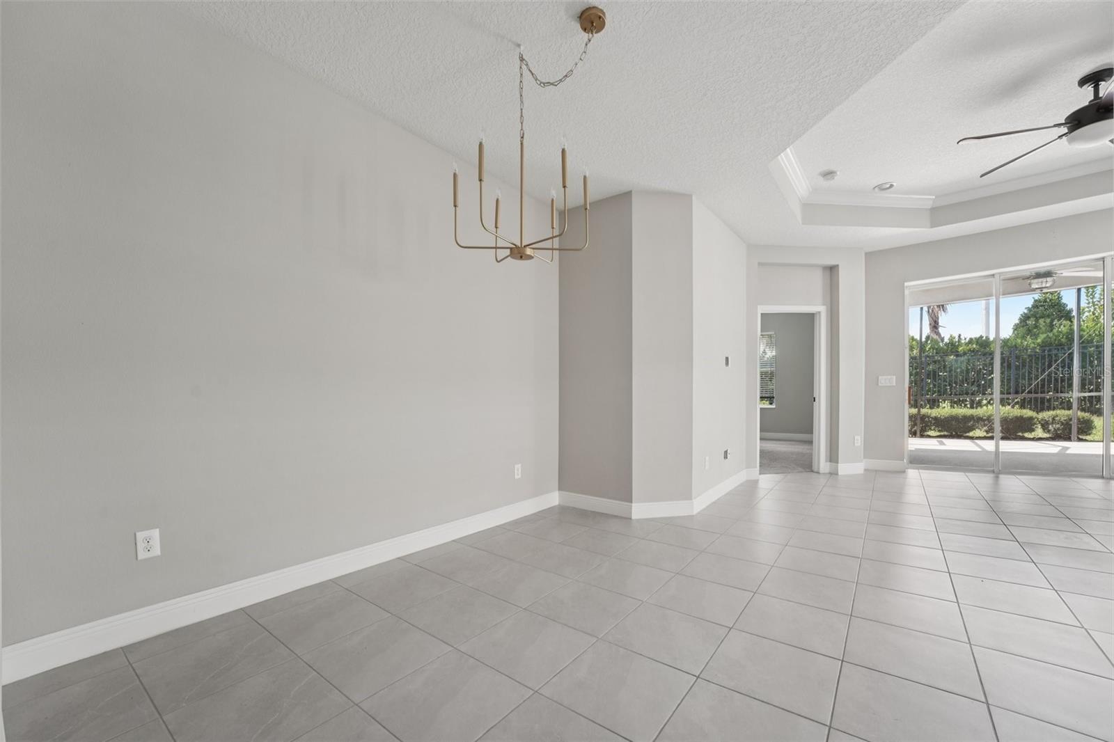 ENTRY LEADS TO A BRIGHT AND OPEN KITCHEN/DINING ROOM COMBO WITH A SPACIOUS FAMILY ROOM