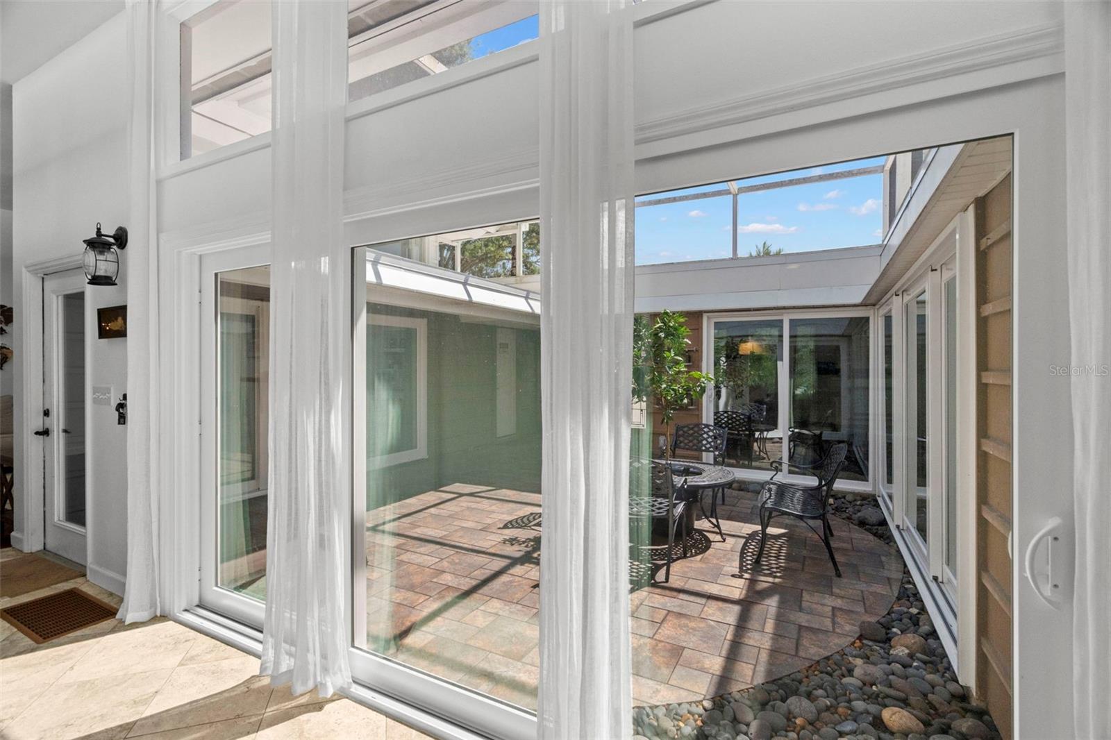 new sliding doors overlooking atrium