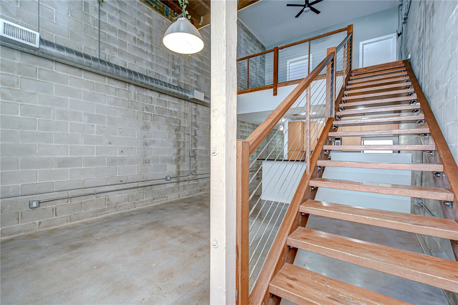 Head upstairs to discover the bedroom area!