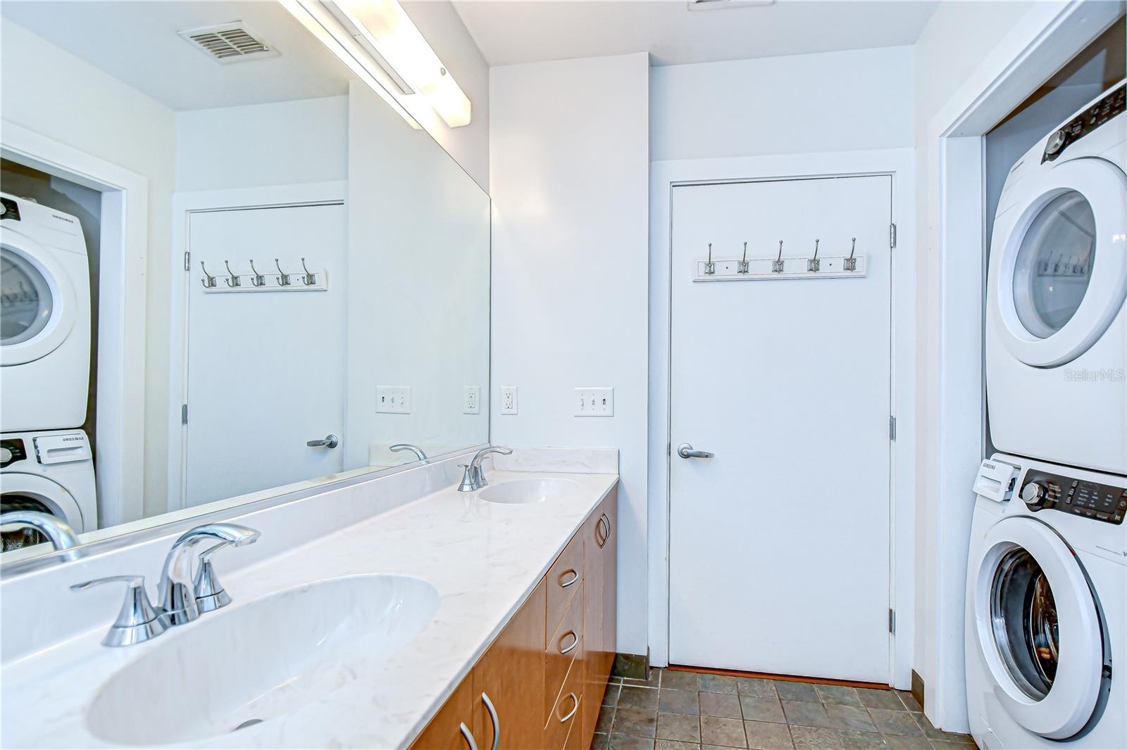 Laundry is set in the primary bathroom!